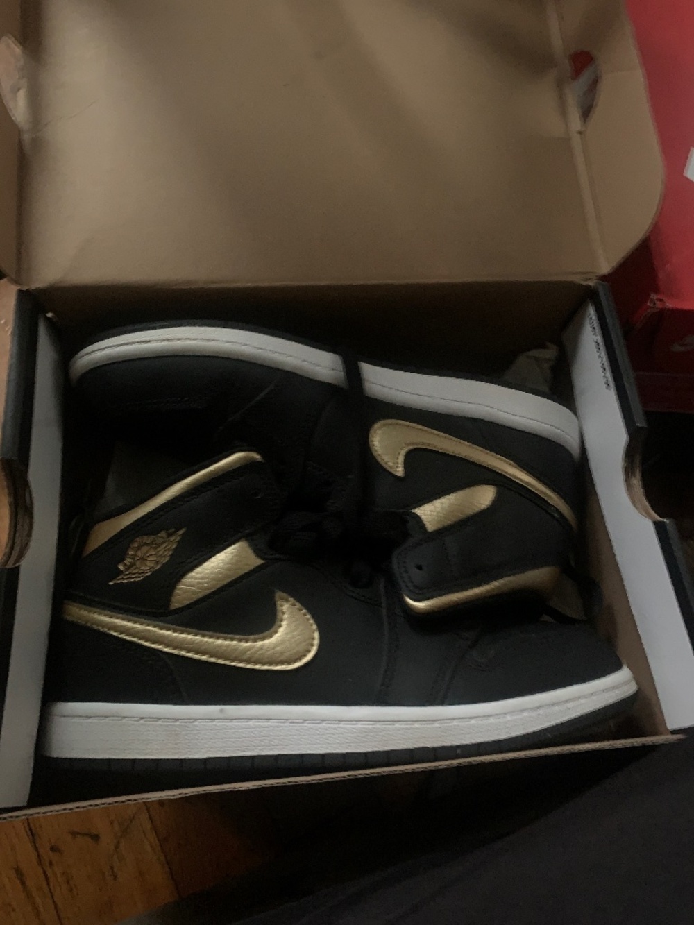 Gold/ black jordans